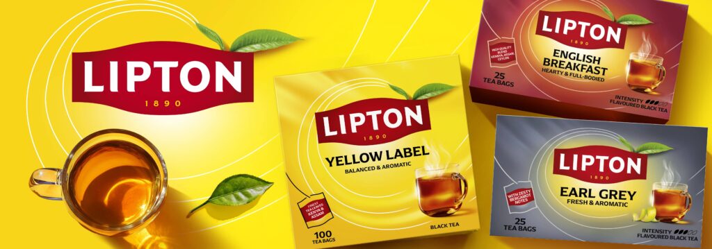 Lipton tea assortment including Yellow Label black tea, English Breakfast tea, and Earl Grey tea with vibrant yellow and red packaging.