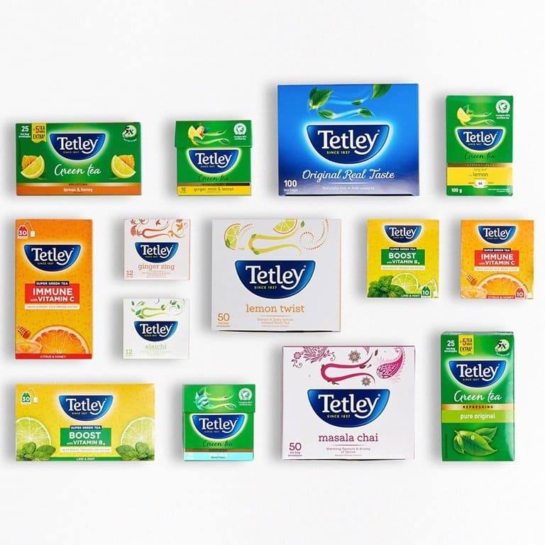 Tetley tea collection featuring green tea, masala chai, lemon twist, immune boost blends, and classic Tetley blue label tea bags.