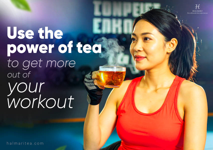 A woman in workout outfit holding a steaming cup of tea at the gym, promoting how tea boosts energy and focus for better workouts